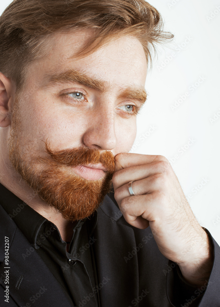 young red hair man with beard and mustache in black suit on white  background Stock Photo | Adobe Stock