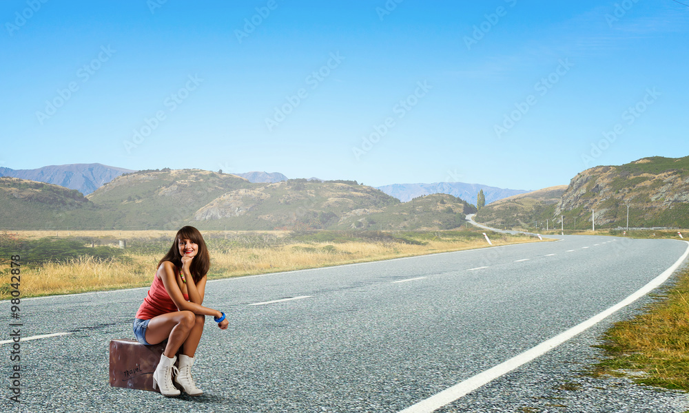 Pretty brunette retro hitchhiker