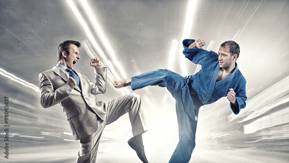 Karate man in blue kimino Karate man in blue kimino