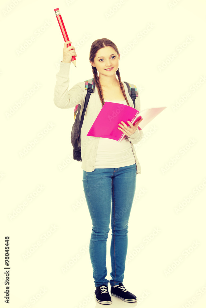 Happy student woman with big pencil. Happy student woman with big pencil.