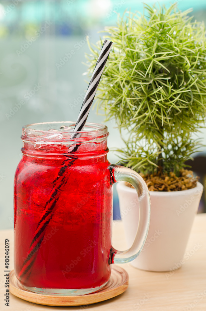 Ice red drink in the glass Ice red drink in the glass