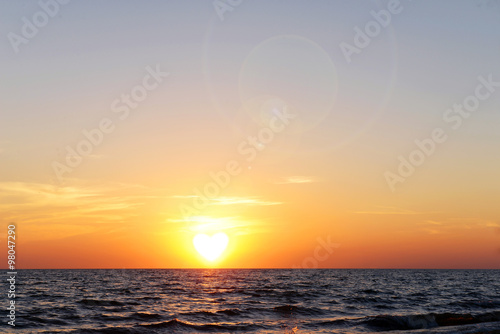 Sunset on the summer beach © Africa Studio