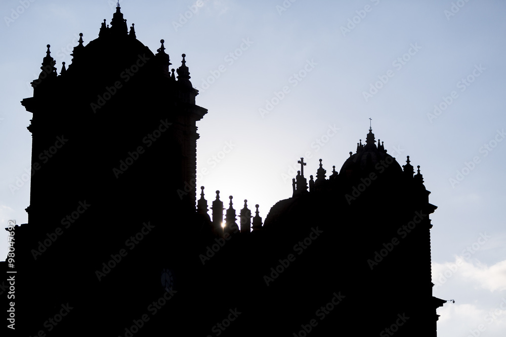 Silhouette of twin towers and dome of the historic Iglesia, Cusc