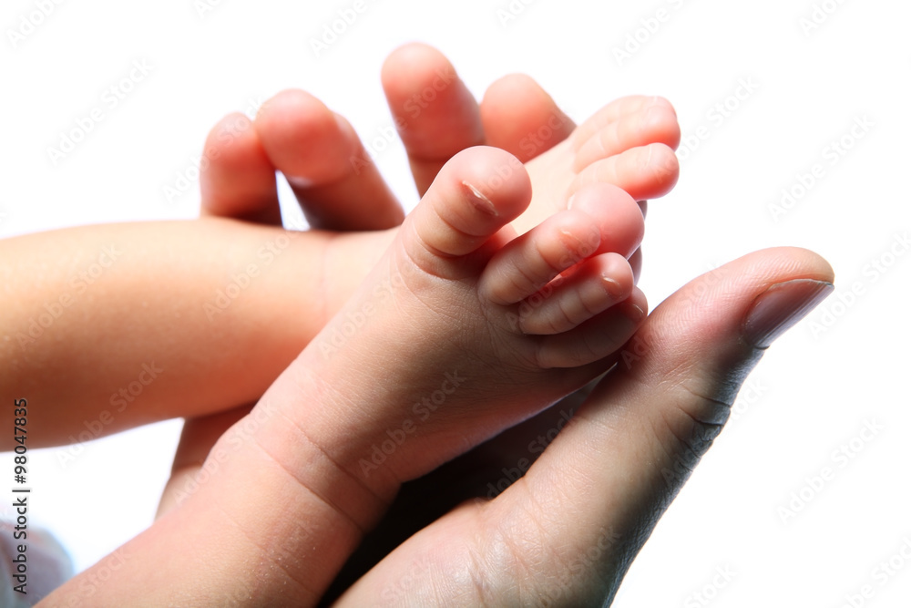 Baby's foot in mother hands. Baby's foot in mother hands.