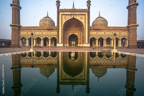 Vászonkép Jama Masjid, Old Delhi, India with reflection and blueish background
