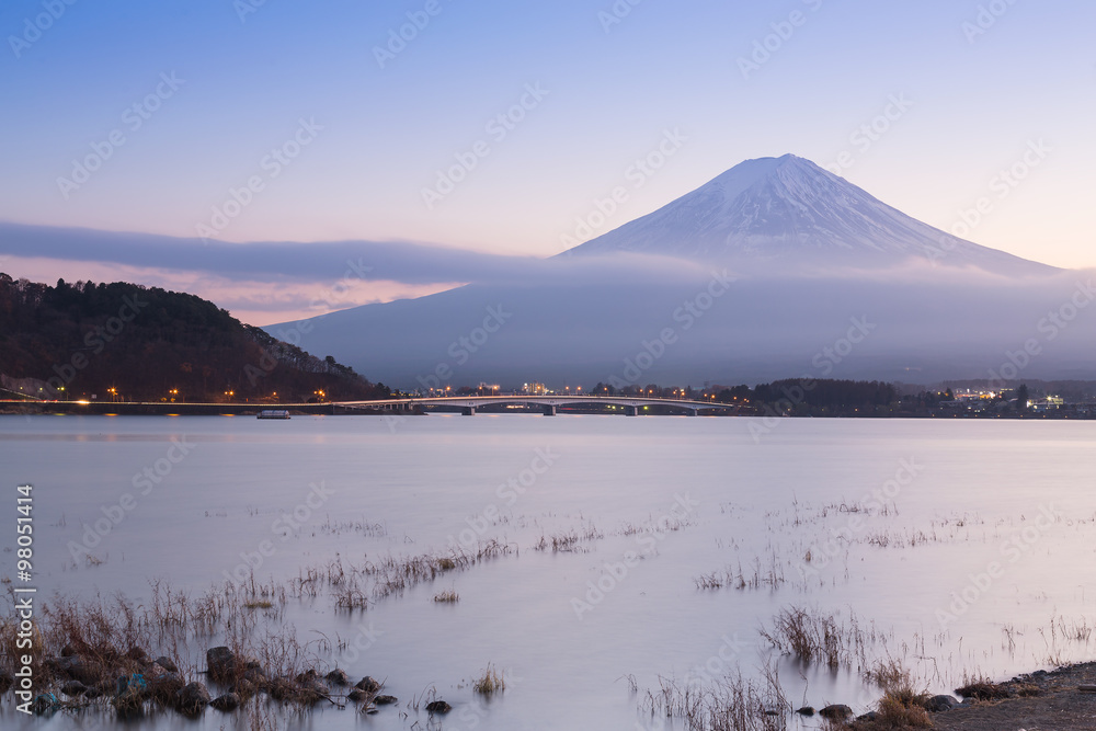 Kawaguchiko Lake with Fuji Mountain background during twilight