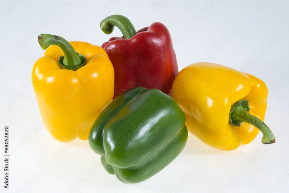 colorful bell peppers isolated on white background colorful bell peppers isolated on white background