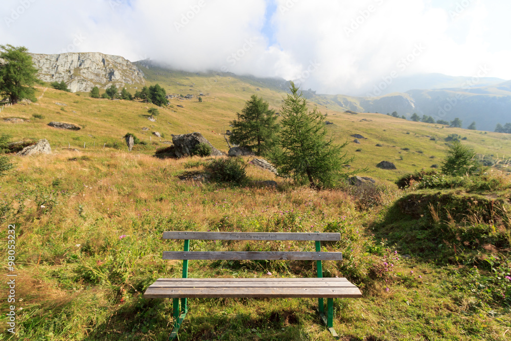 Bench and mountain in the Alps, Austria