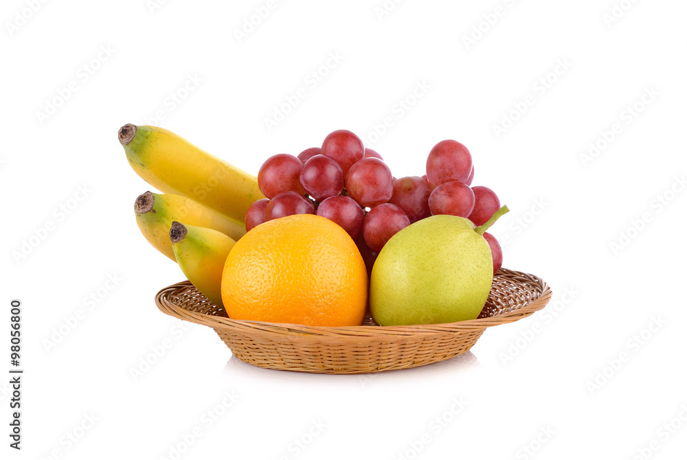 mixed fruit, banana, orange, pear, grape in basket on white back mixed fruit, banana, orange, pear, grape in basket on white back