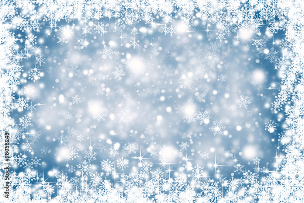 Blurry blue color abstract snowflakes. Christmas background