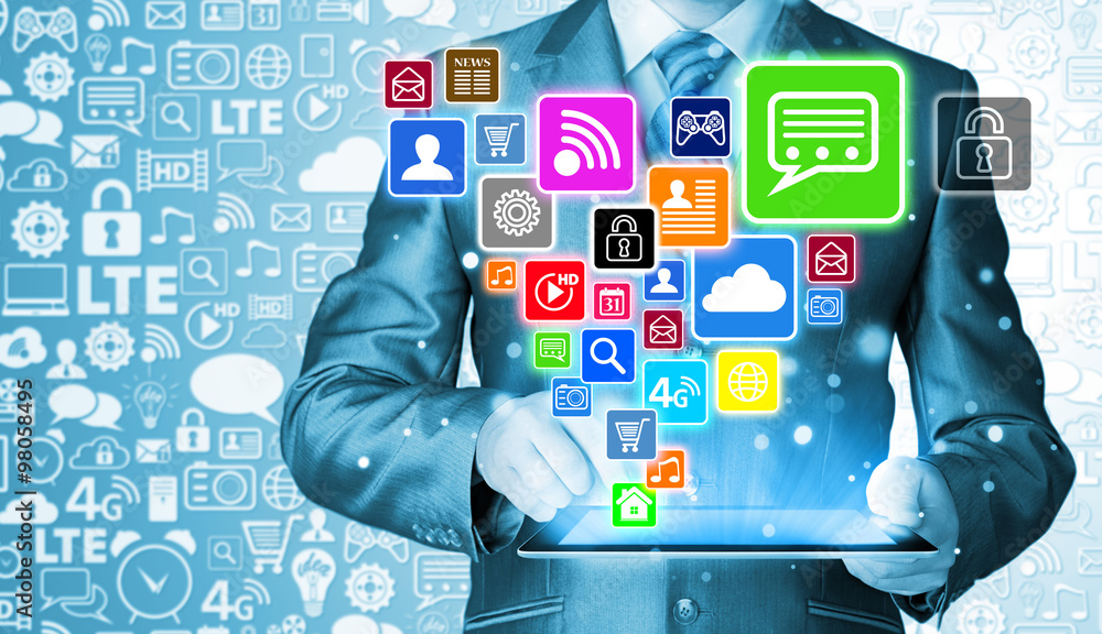 Business man using tablet PC with social media icon set Business man using tablet PC with social media icon set