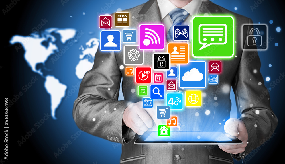 Business man using tablet PC with social media icon set Business man using tablet PC with social media icon set