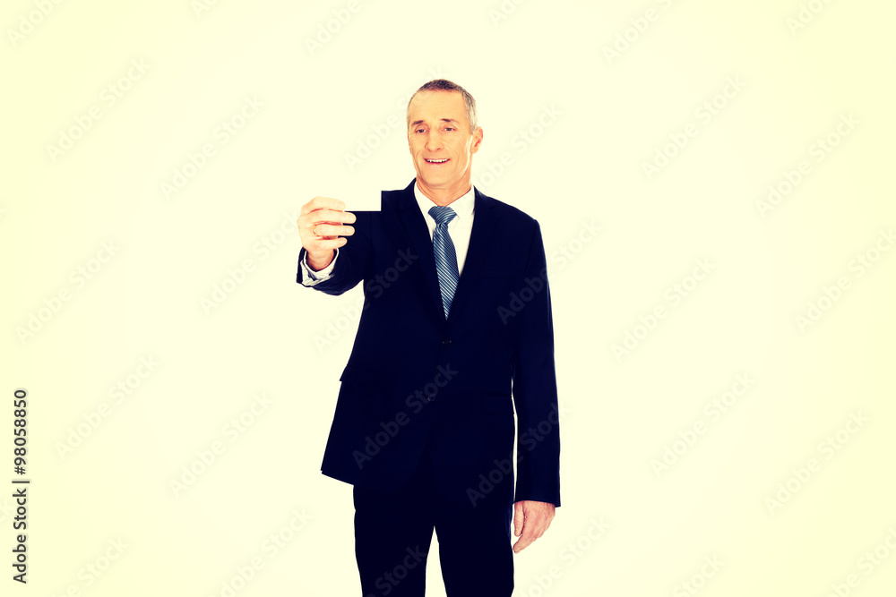 Businessman showing a blank identity name card