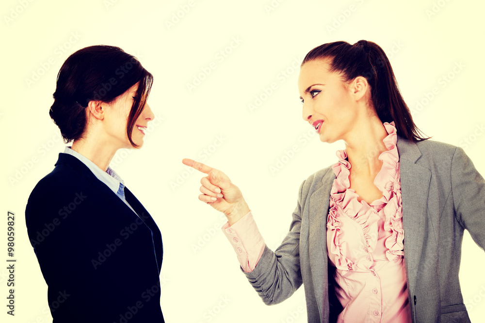 Angry businesswoman accuses her partner. Angry businesswoman accuses her partner.
