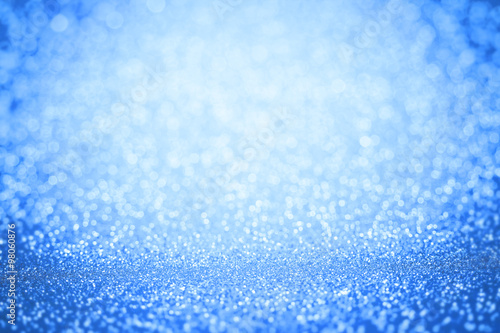 Abstract blur blue bokeh lighting from glitter texture
