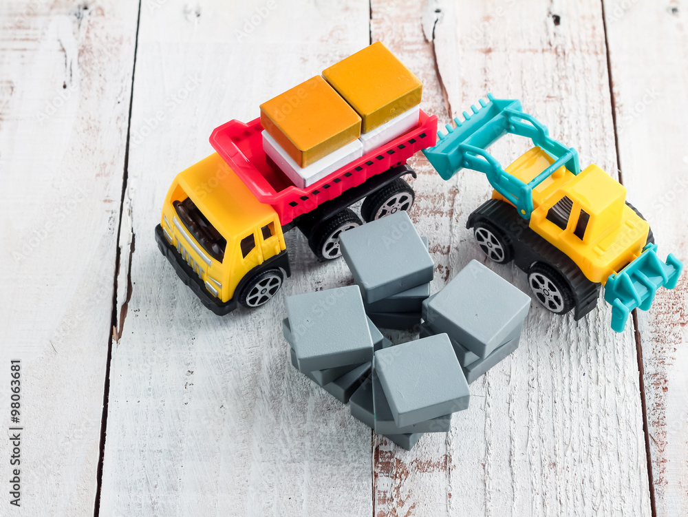 wood block stack with car toys