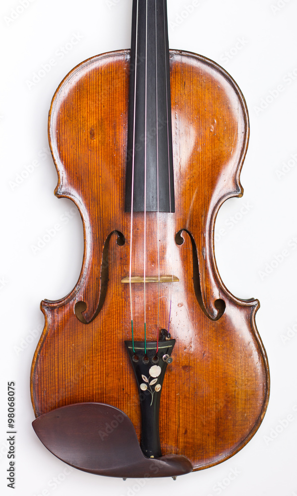 A beautiful violin on a white background.musical instruments. stringed instruments A beautiful violin on a white background.musical instruments. stringed instruments