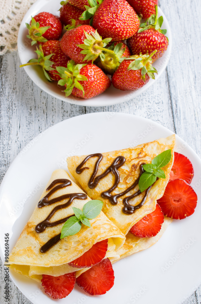 Pancakes with sliced strawberries Pancakes with sliced strawberries