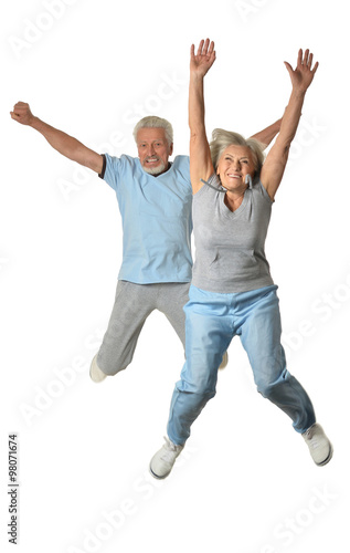 Senior couple jumping