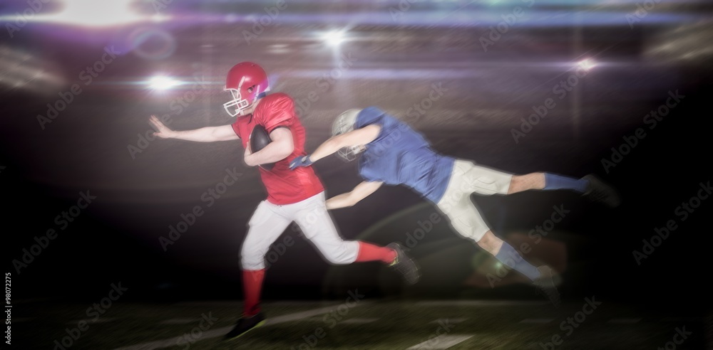 Obraz premium Composite image of american football players