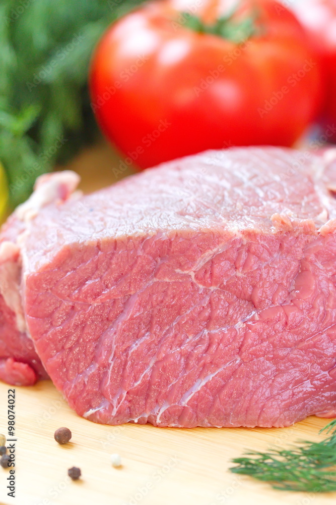Fototapeta premium Raw meat with vegetables and spices