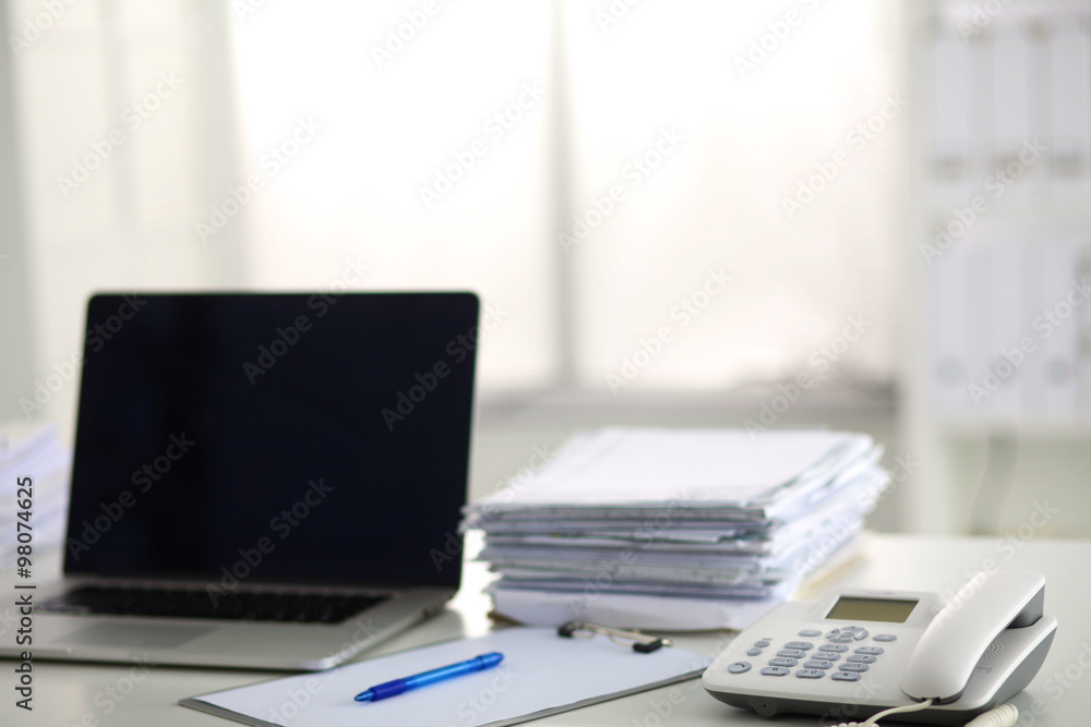 office desk a stack of computer paper reports work forms office desk a stack of computer paper reports work forms