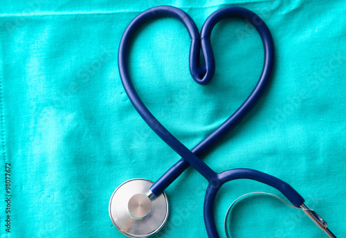 Stethoscope on a background of medical coat