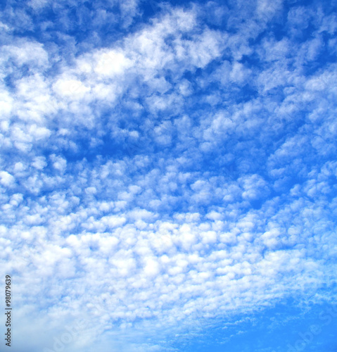 in the blue sky white soft clouds and abstract background