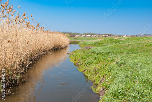 Fototapeta Naklejka Na Ścianę i Meble -  Landscape with Ukrainian river Sura at early spring season