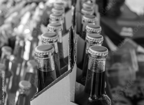 Closeup of assorted soda bottles