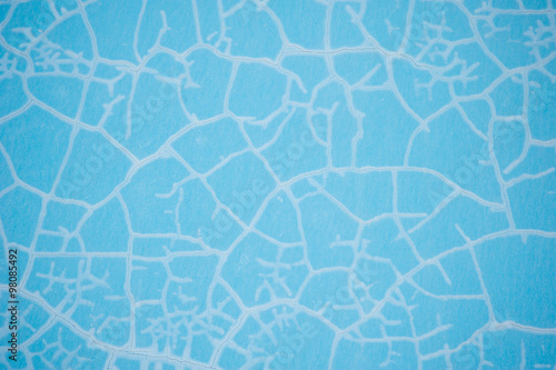 cracked blue wall in the room © timonko