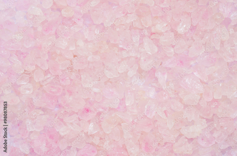 Closeup surface pile of pink crystal stone texture background
