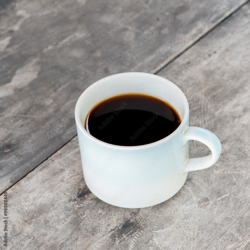 Coffee cup on old table Coffee cup on old table