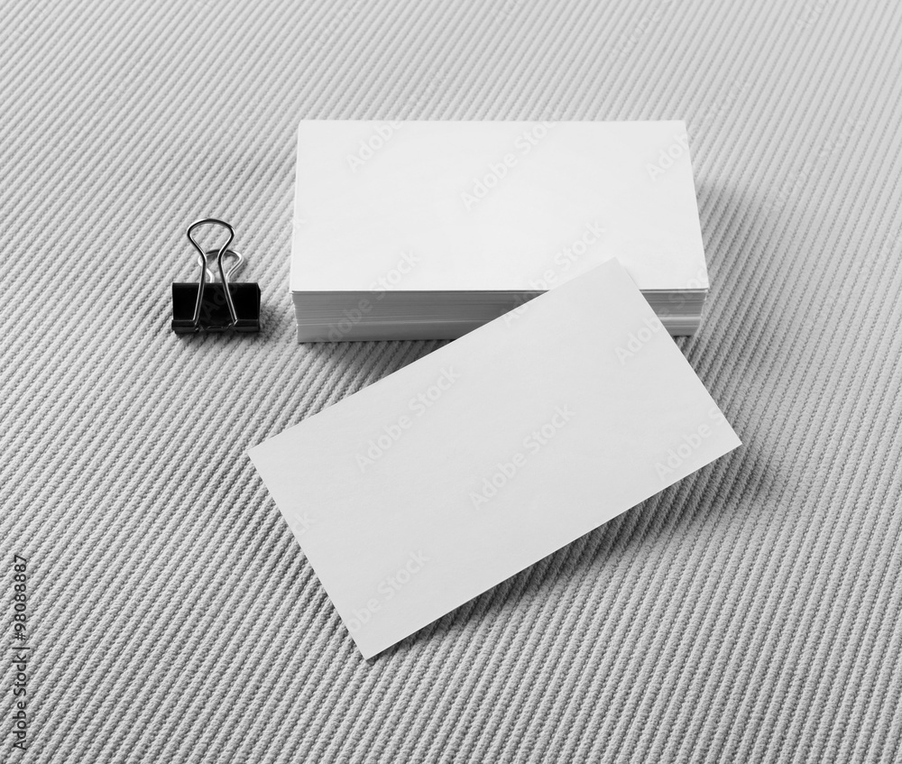 Blank business cards on gray background. Mock-up for branding identity. Blank business cards on gray background. Mock-up for branding identity.