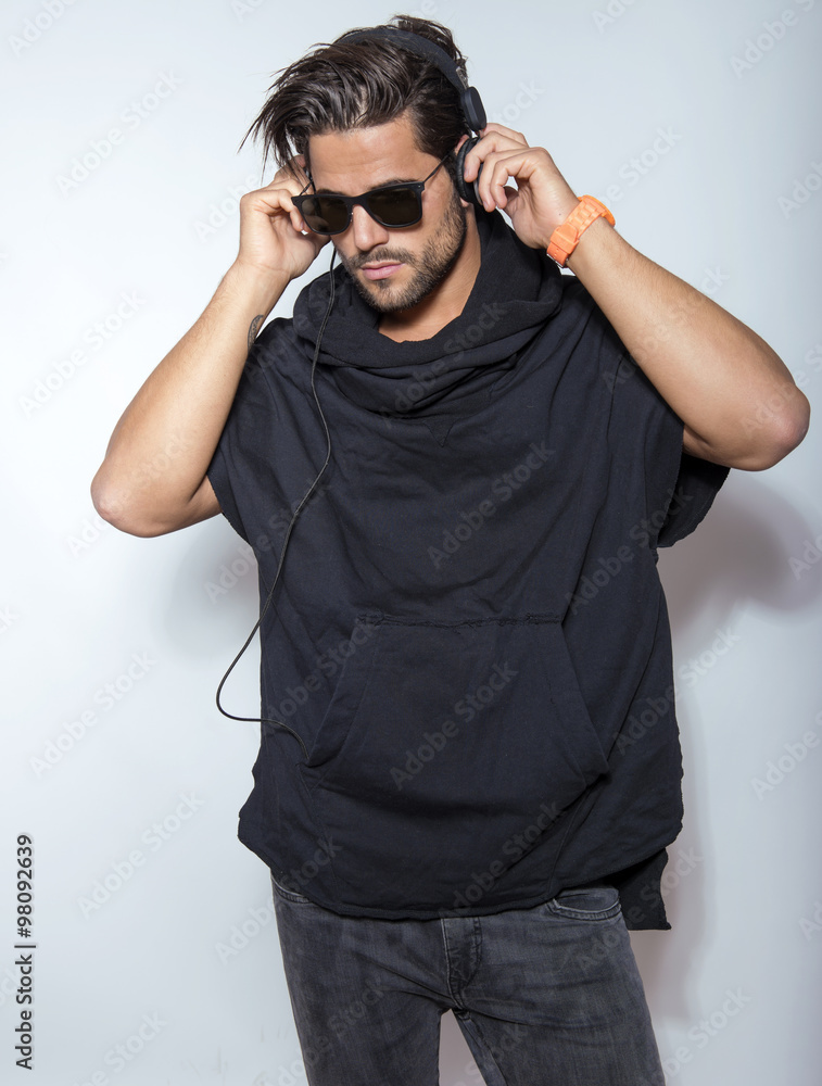 handsome young and fit man posing in casual clothes handsome young and fit man posing in casual clothes