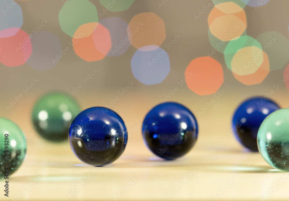 Glass balls on the background bokeh. Texture of colorful balloons. Glass balls on the background bokeh. Texture of colorful balloons.