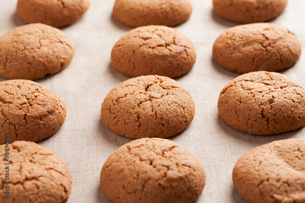 Oatmeal cookies on burlap tablecloth Oatmeal cookies on burlap tablecloth
