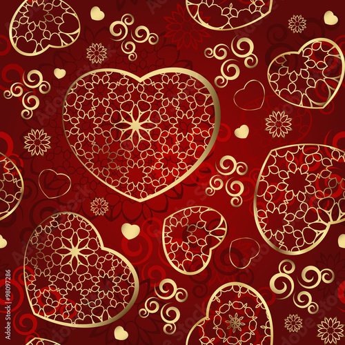 Seamless wallpaper with gold hearts on a red background photo