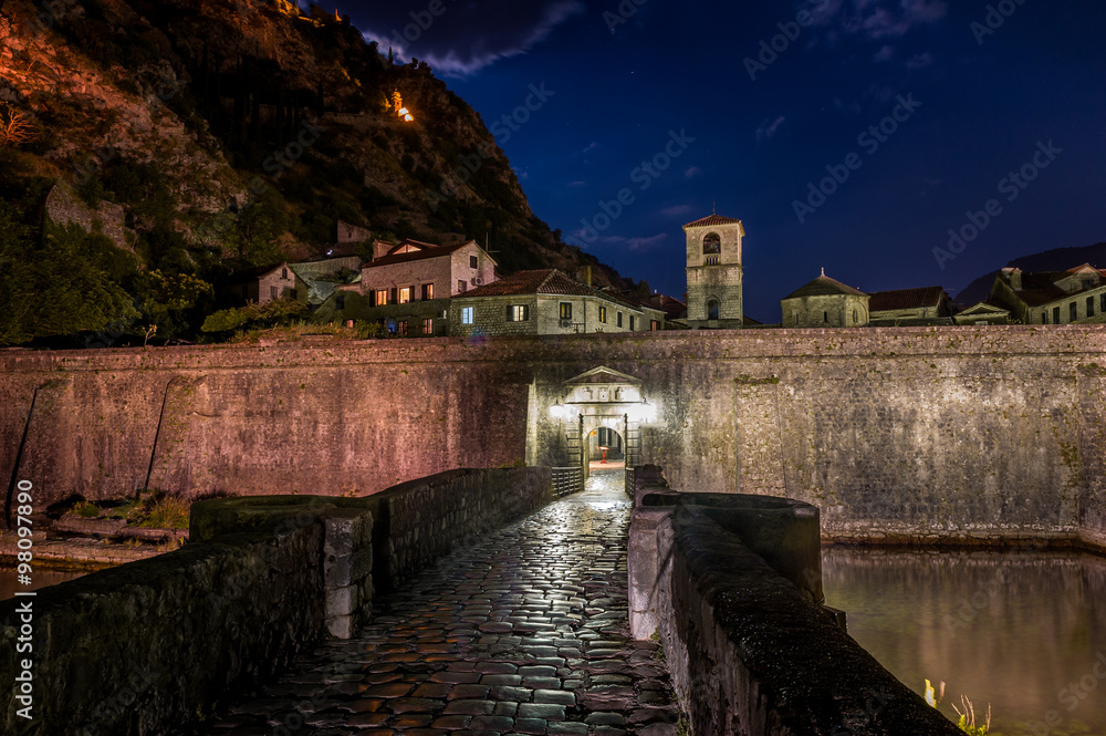 Gate to Kotor ancient fortress at night