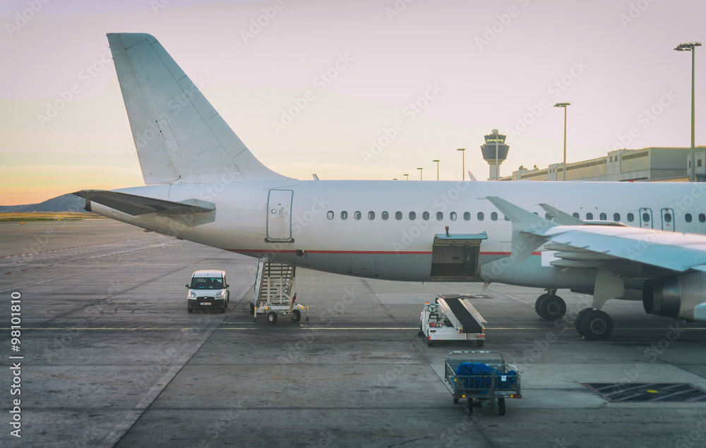 Obraz premium Passenger plane in the airport. Aircraft maintenance.