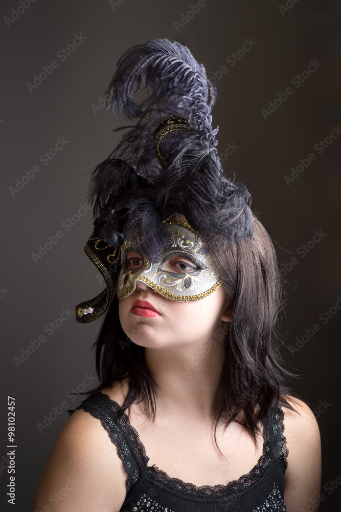 young girls portrait with venetian mask