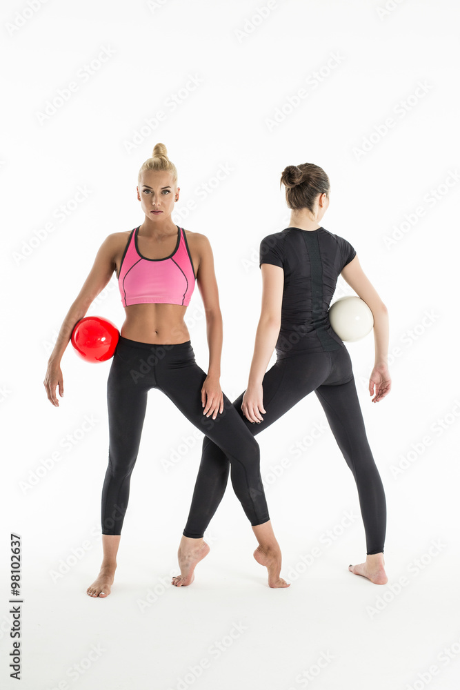 Fototapeta premium Two girls with balls