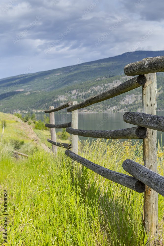 Old Wooden Farm Fence at Scenic Lake Shore Old Wooden Farm Fence at Scenic Lake Shore