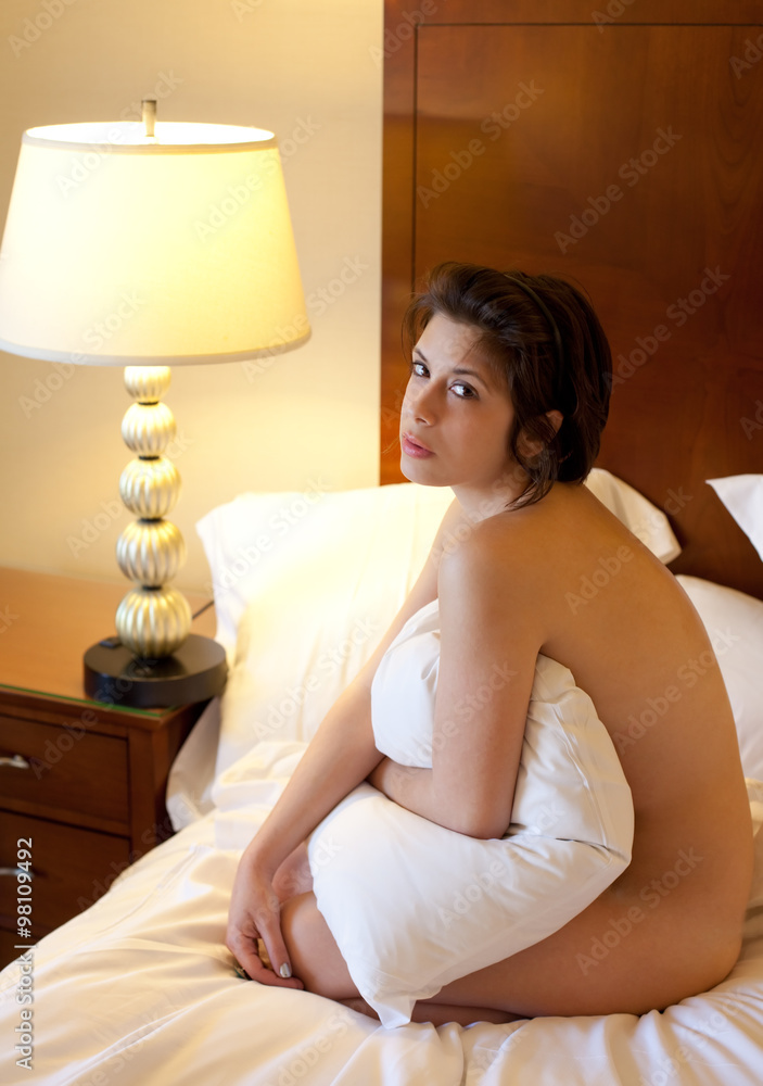Nude Woman on Bed With Pillow Stock Photo | Adobe Stock