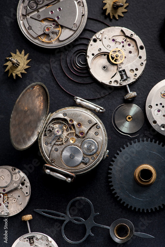 antique pocket watch, gears and mechanisms