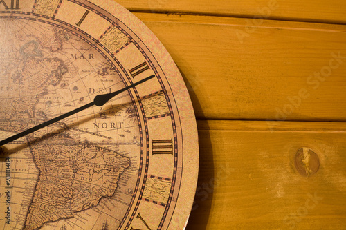 Large yellow clock on the wall