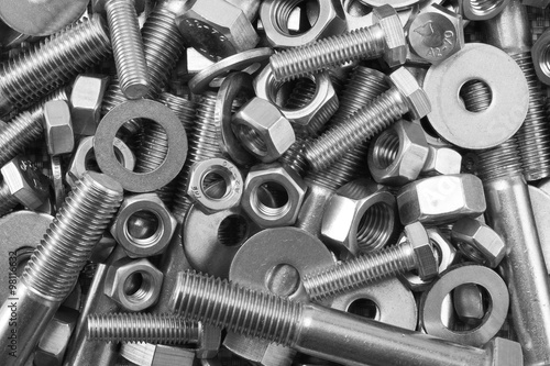 Mixture of stainless steel nuts bolts and washers / A mixture of stainless steel nuts bolts and washers in a heap