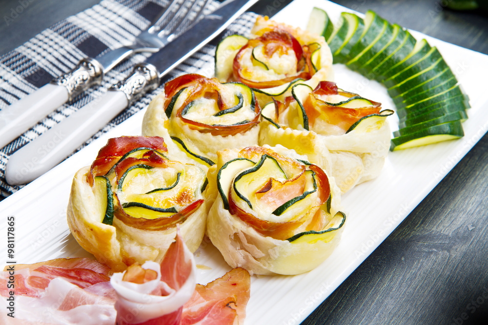 roses puff pastry with zucchini and bacon - obrazy, fototapety, plakaty 