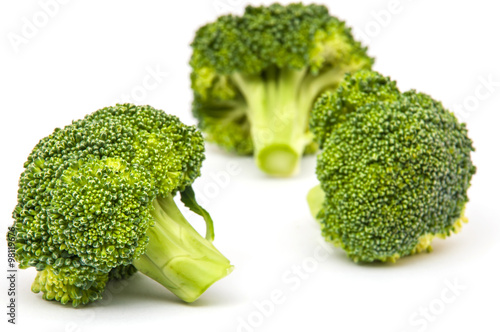 Isolated broccoli over white background, focus at the nearest one