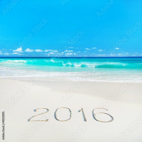 Еropical beach with 2016 year sand caption. Season vacation con